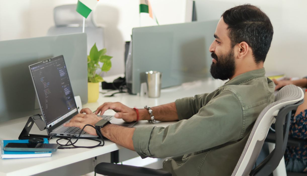 An accountant at his desk in an office in India